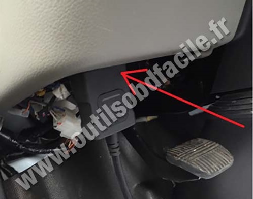 Nissan Cabstar OBD plug under steering wheel